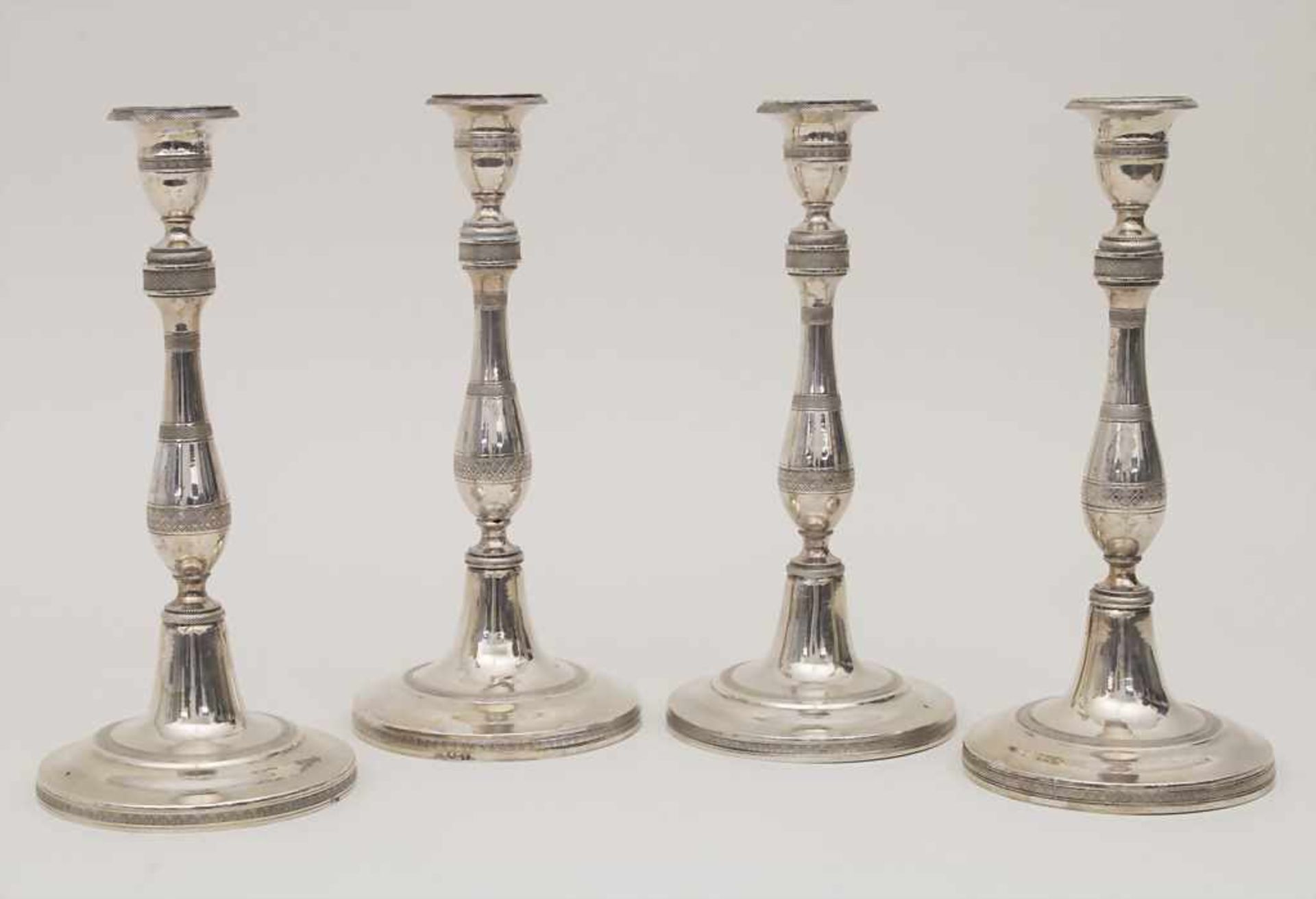 Vier Empire Kerzenleuchter / A set of four Empire silver candlesticks, Neapel/Napoli, um