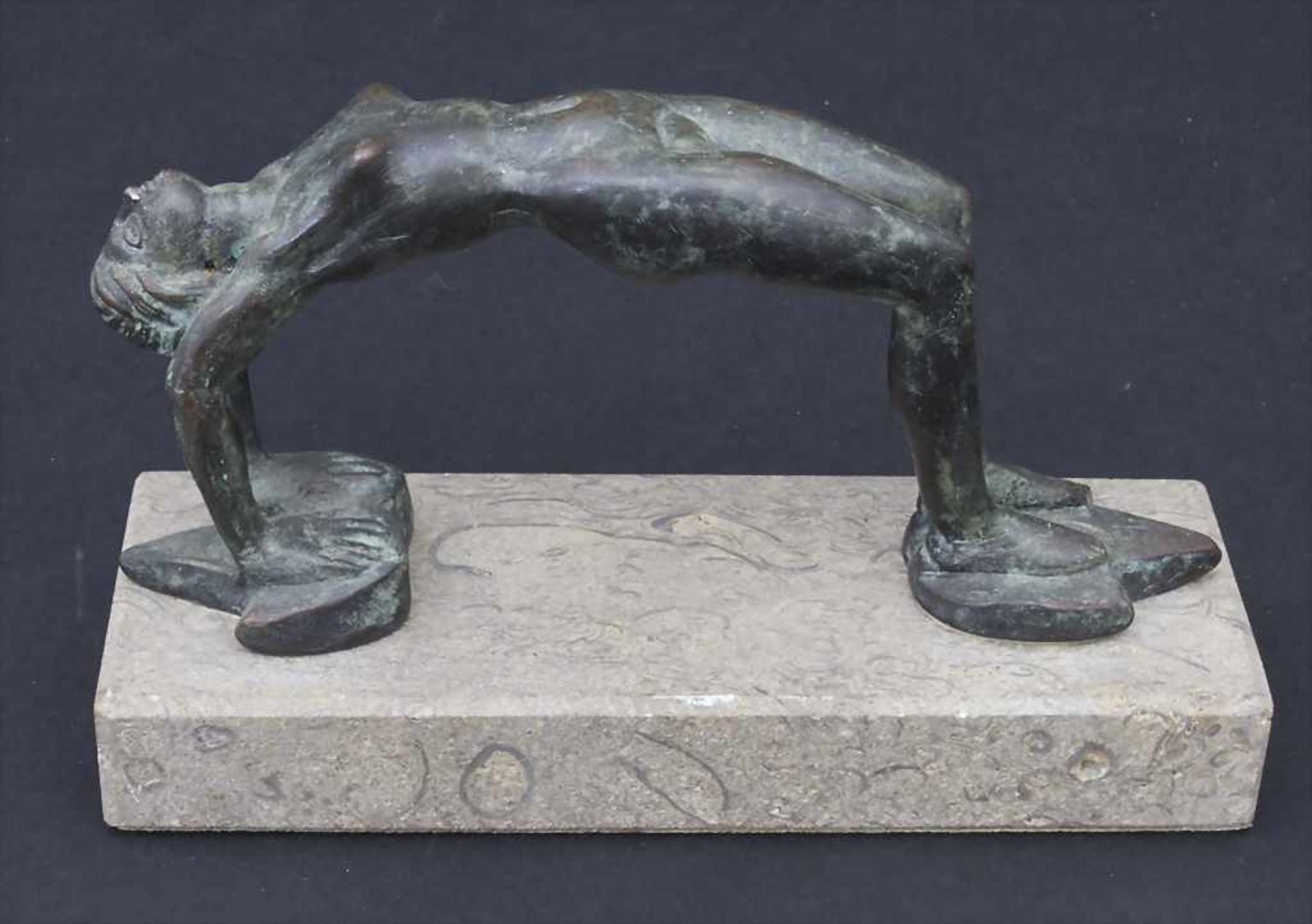 Figurengriff 'Weiblicher Akt' / A figural handle 'Female nude'Technik: Bronze, patiniert, auf