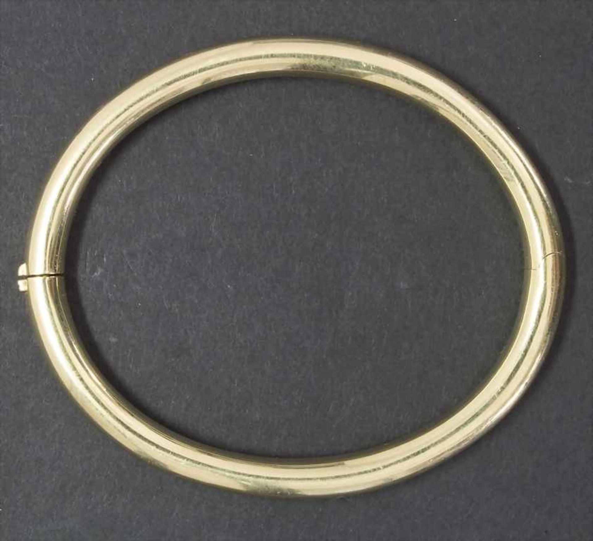 Armreif / A bracelet, 20 Jh.Material: Gelbgold Au 585/000 14 Kt,Maße: innen 50 x 60 mm, D. 5 mm,