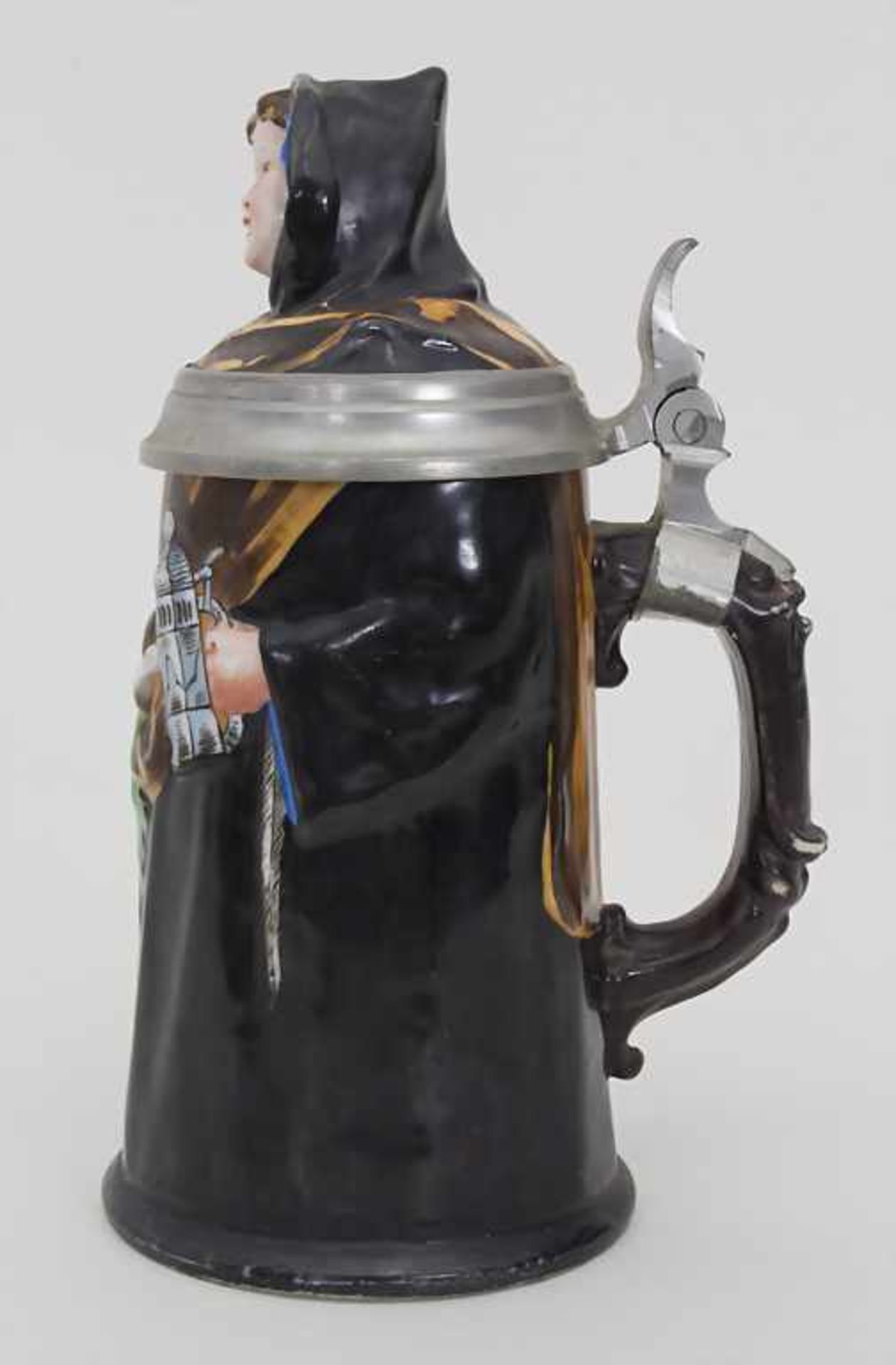 Figürlicher Bierkrug 'Münchner Kindl' / A figural porcelain beer mug, um 1900Material: Porzellan - Bild 2 aus 7