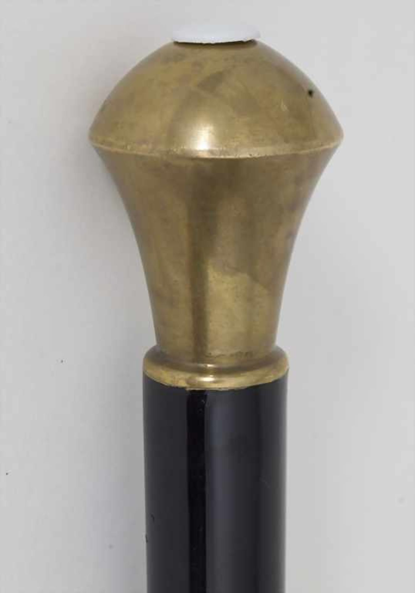 Gehstock mit Messingknauf / A cane with brass knob, um 1900Material: Ebenholz, Messingknauf,
