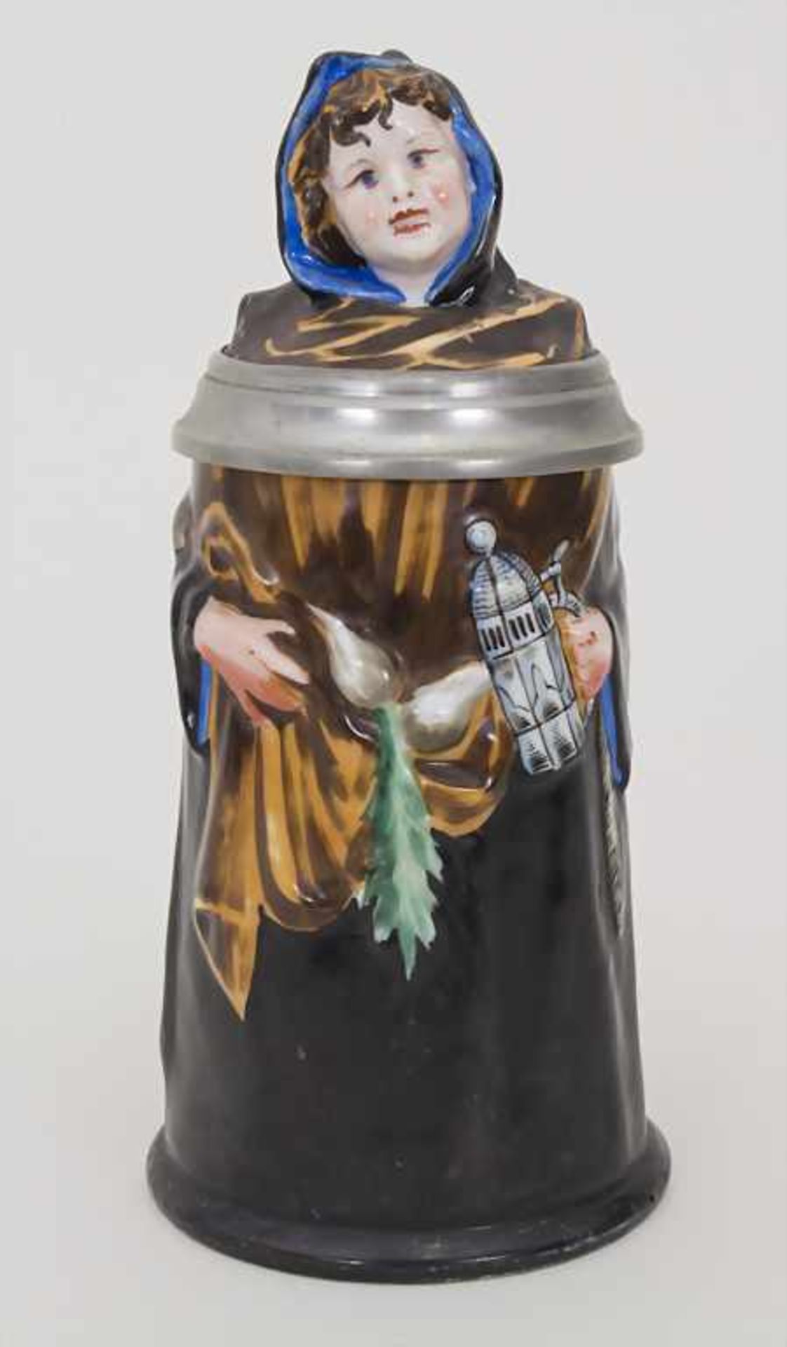 Figürlicher Bierkrug 'Münchner Kindl' / A figural porcelain beer mug, um 1900<b