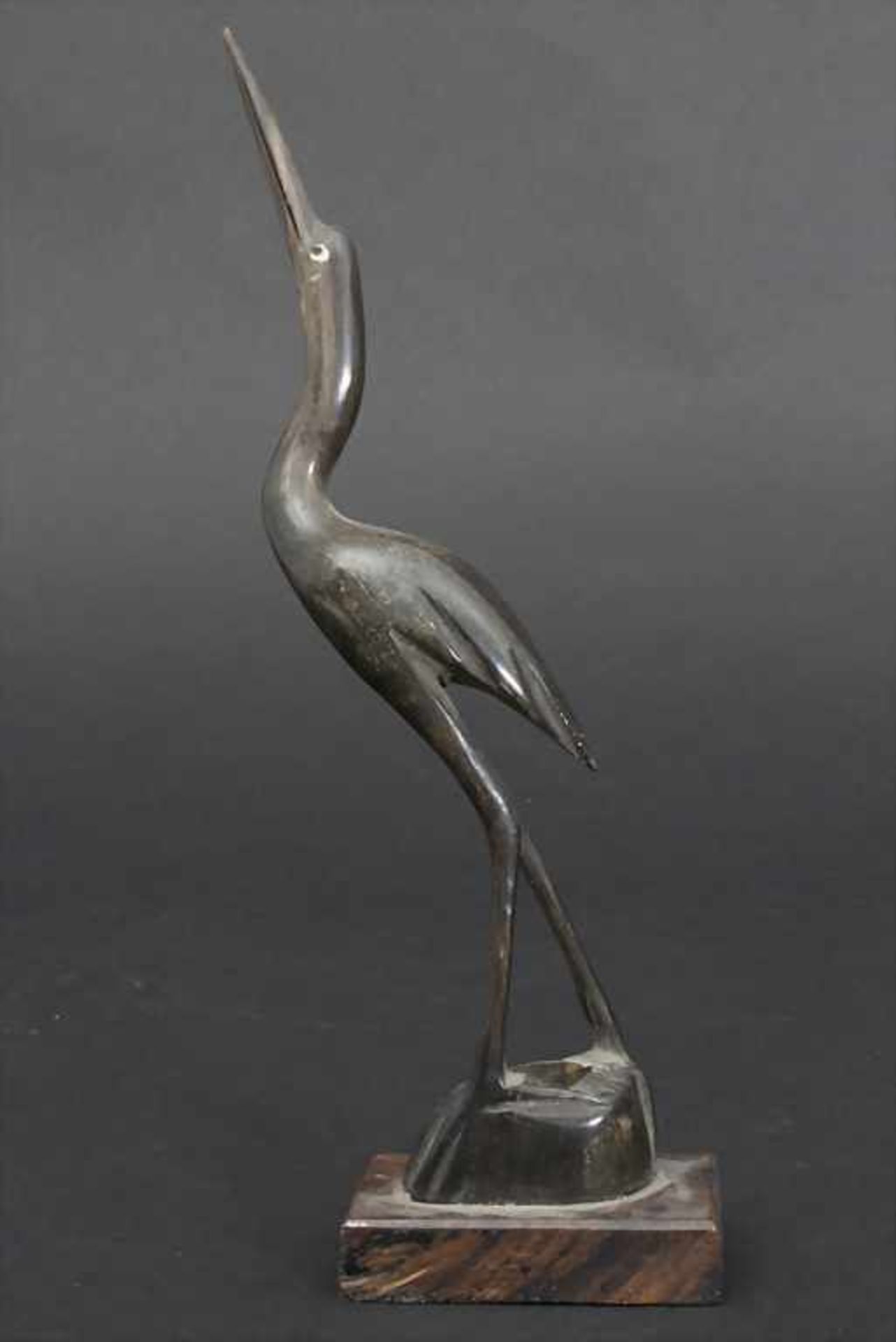 Abstrakte Figurengruppe und Kranich / An abstract figural group with a crane, Afrika, 20. Jh. - Image 2 of 2