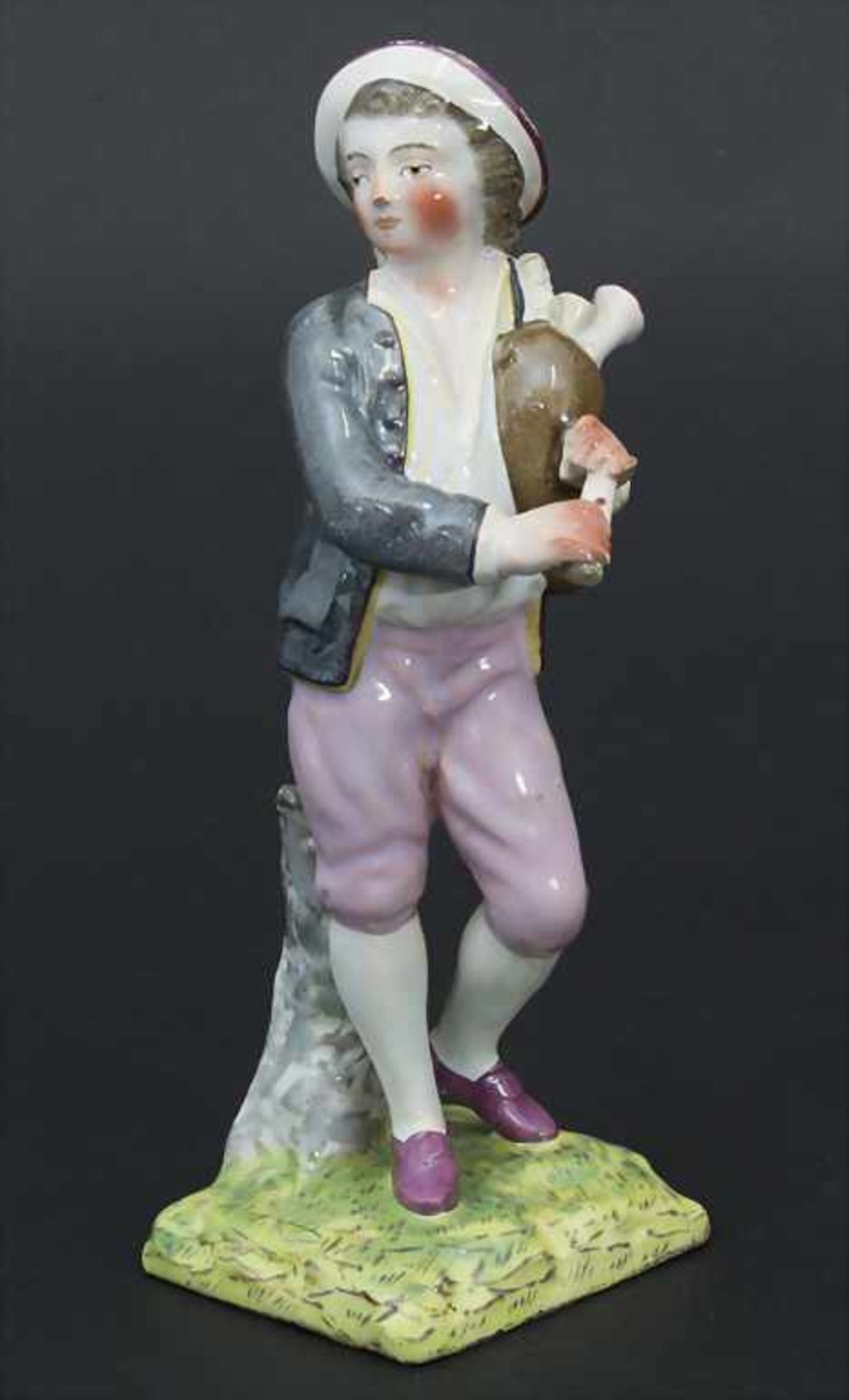 Fayence Figur eines Dudelsackspielers / A faience figure of a bagpiper, Paul Hannong, Straßburg /