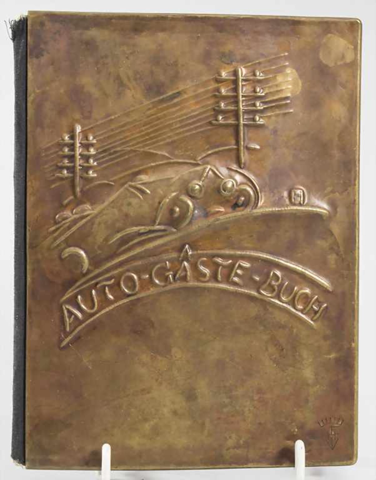 Art Déco Gästebuch mit Rennwagen Motiv / An Art Deco guest book with racing car decor
