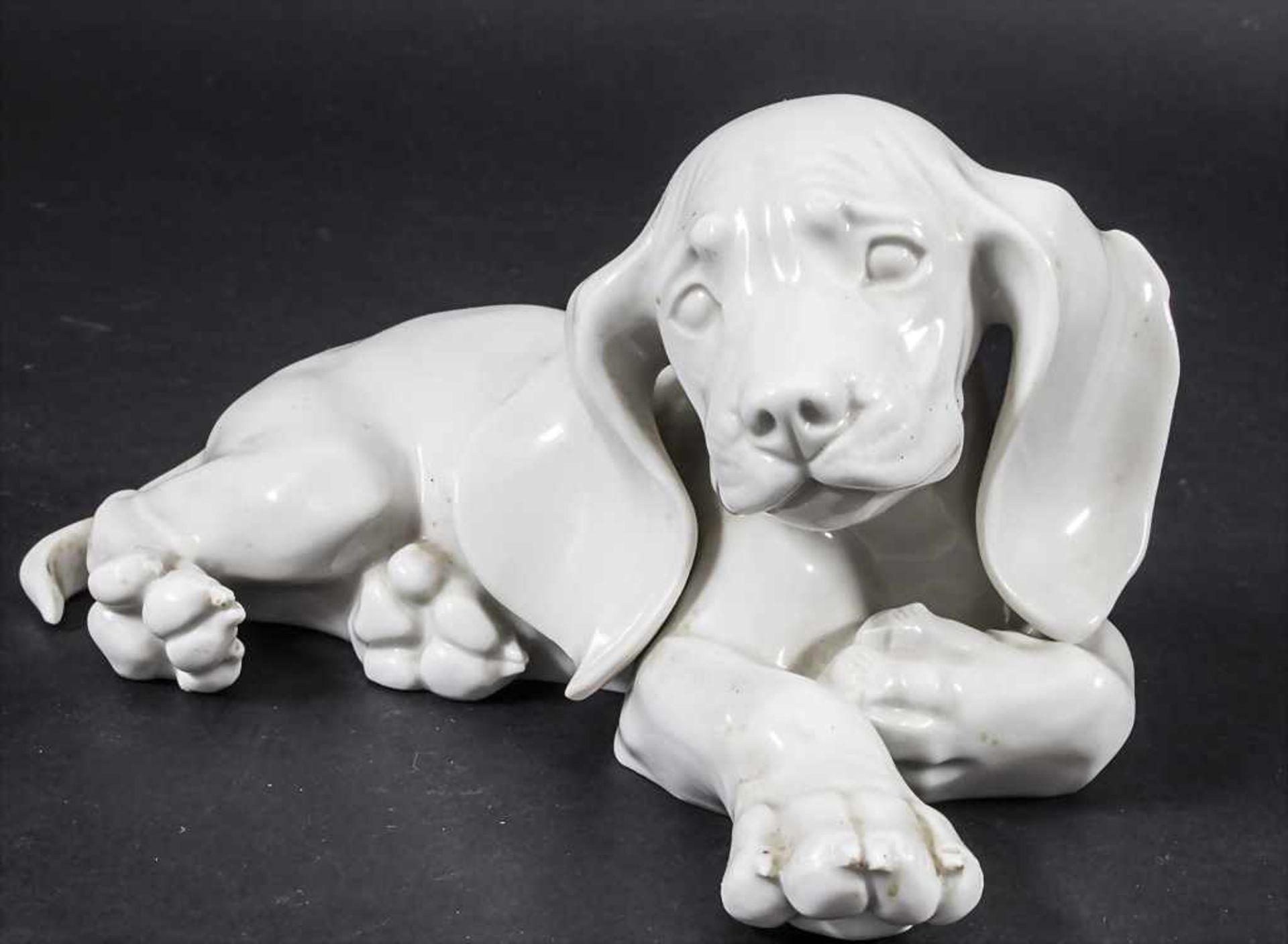 Liegender Cocker Spaniel Welpe / A reclining cocker spaniel puppy, Allach, 1936-45