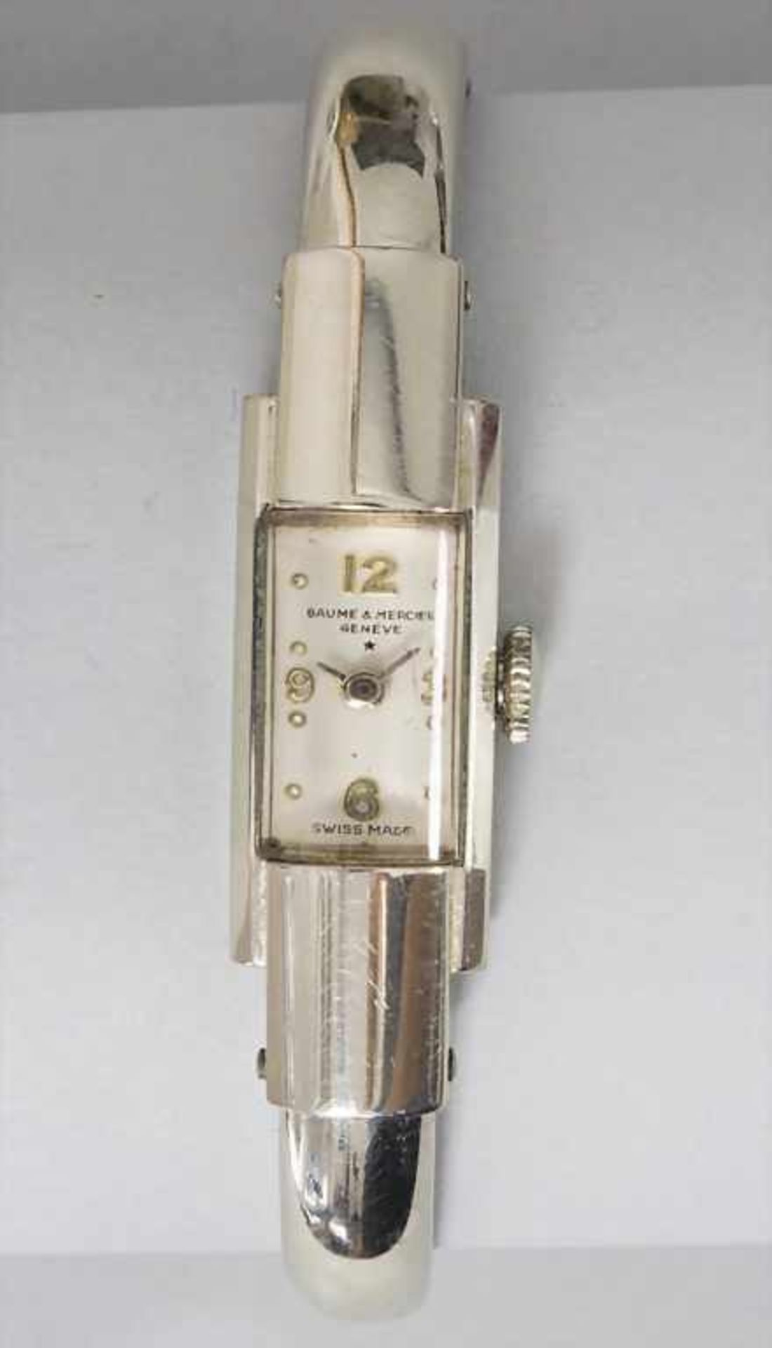 Damenarmbanduhr in Gold / A lady's wristwatch in gold, Baume et Mercier, Geneve, um 1960