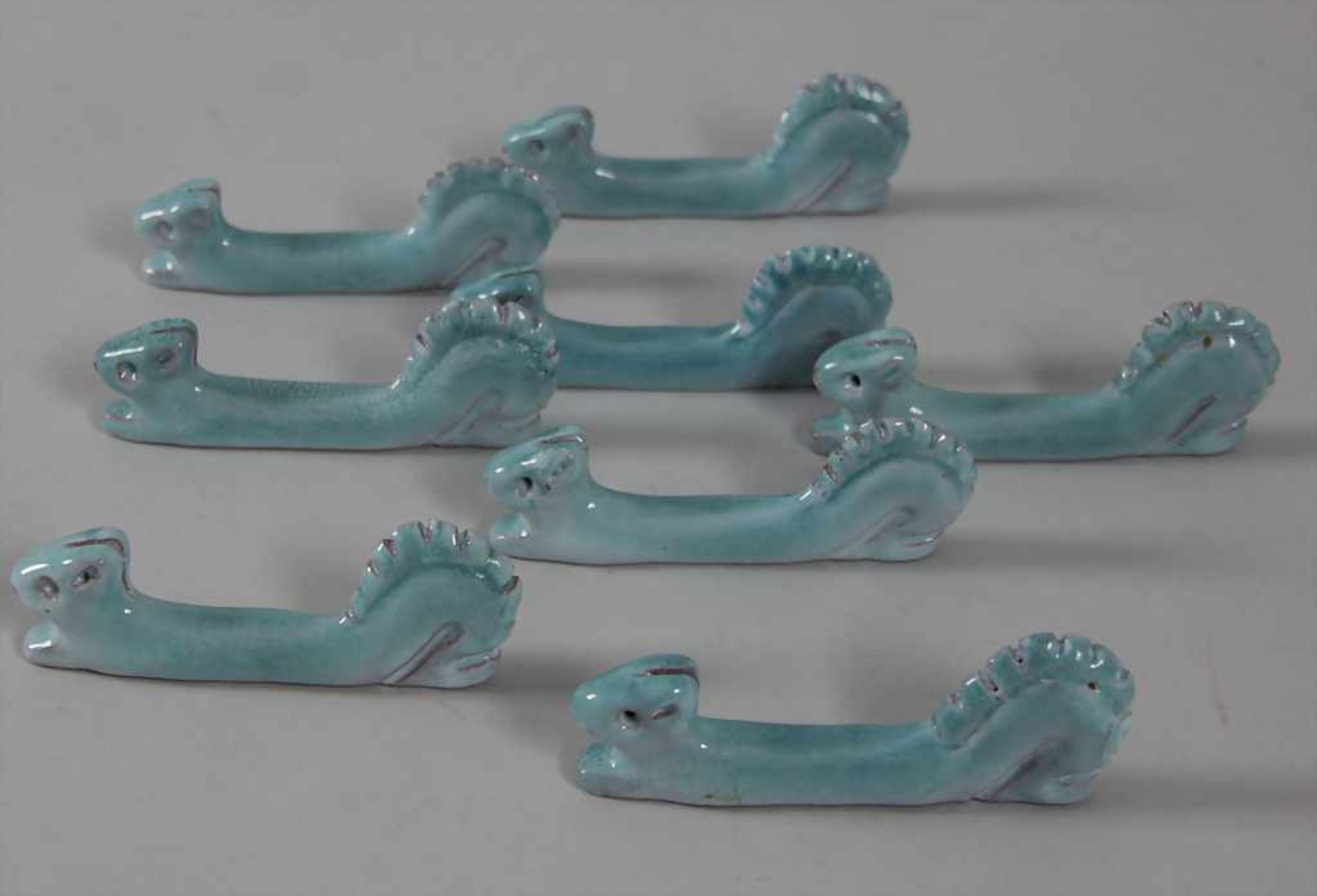 8 figürliche Messerbänkchen 'Eichhörnchen' / A set of 8 figural knife rests 'squirrel', wohl