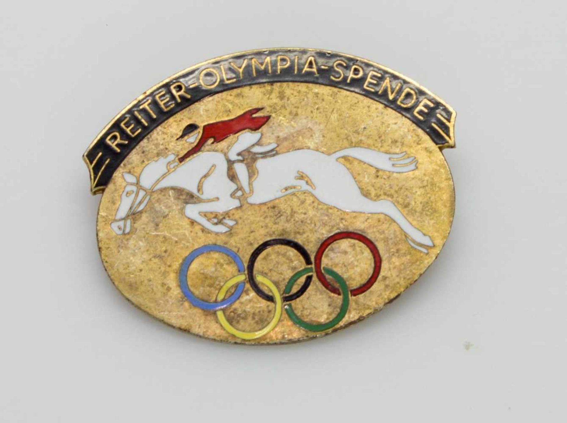 AbzeichenIII. Reich, „Reiter-Olympia-Spende", vergoldetes, emailliertes Abzeichen mit springendem