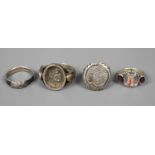Konvolut religiöser Ringe19. Jh., vier Stück, teils Silber geprüft, besetzt mit Granaten und