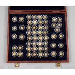 Kollektion Kleinste Goldmünzen der Welt53 Stück, meist 585er Gold, in Sammelkapseln mit
