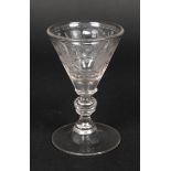 Spitzkelch um 1680farbloses Glas mit Abriss, breiter Scheibenfuß, Balusterschaft mit Nodi,