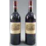 1992 Chateau Lafite Rothschild. 1er Grand Cru Classé. 2 whole bottles.<