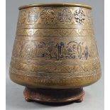 Brass bowl. Openwork at the top. Kufic calligraphy.