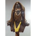 Mask. Wood and textile. 183 cm high with stand. Africa.