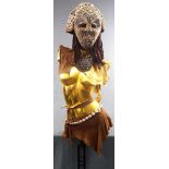 Mask, mounted on a gold-colored bust. 182 cm high with stand. Africa.
