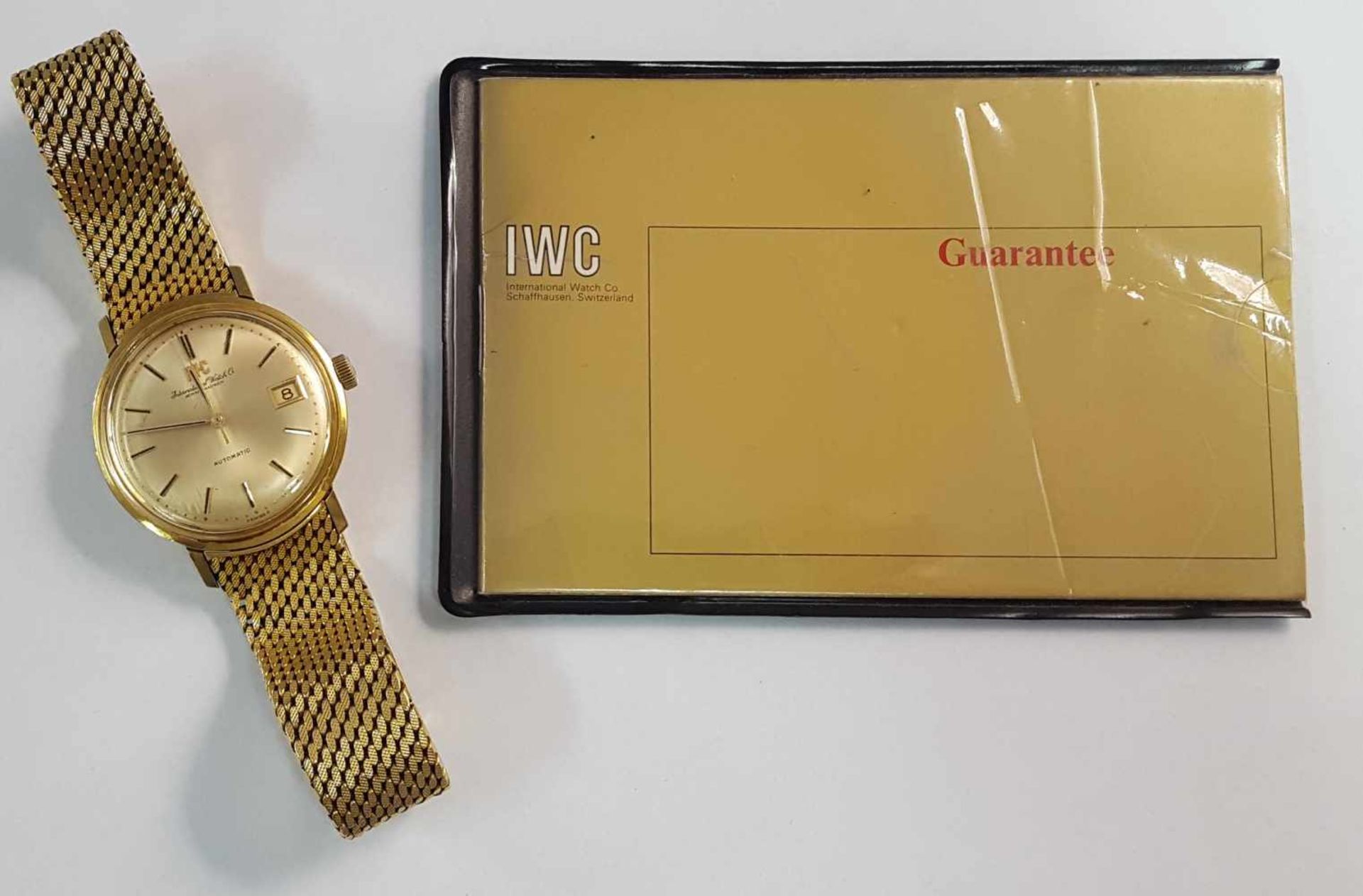 IWC men's wristwatch, automatic, 750 yellow gold. About 122 grams.