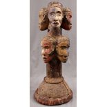 Sculpture. Wood. 8 heads. Probably Congo. 47 cm high. Genealogical tree?