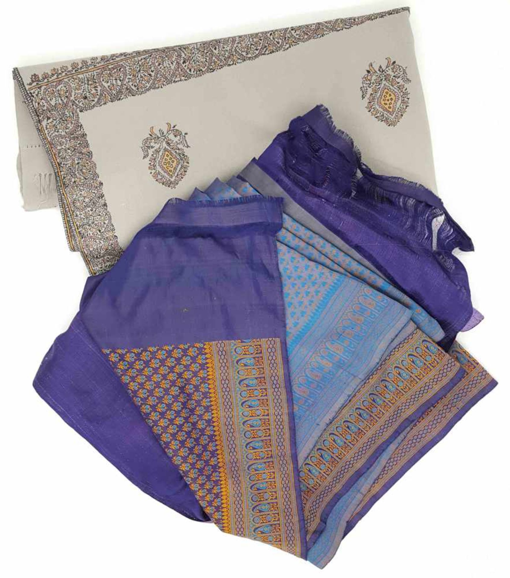 2 textiles. A silk sarong and a Pashmina scarf.
