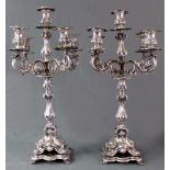 A pair of candlesticks, cilver- plated, 5 flames.