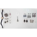 Silver jewelry. Pendants, rings, earrings, watch and brooches.