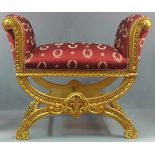Empire-style chair, carved wood, gold-colored.