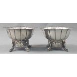 2 silver spice bowls.