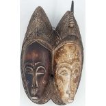 Double mask. Wood. Probably Baule. Man And Woman? 32 cm high.