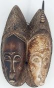 Double mask. Wood. Probably Baule. Man And Woman? 32 cm high.