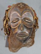 Dance mask. Wood. Proably Congo Chokwe. 23 cm high.