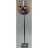 Mask. Newborn? Wood. On stand. Diameter 30 cm.