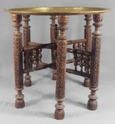 Tea table with brass plate. Probably Arabia. Antique, around 1900.