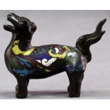 Bronze dog with cloisonne. Proably China old. 10 cm long.