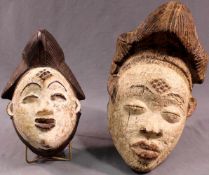 2 masks. Proably Congo probably. Up to 46 cm high.