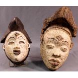 2 masks. Proably Congo probably. Up to 46 cm high.