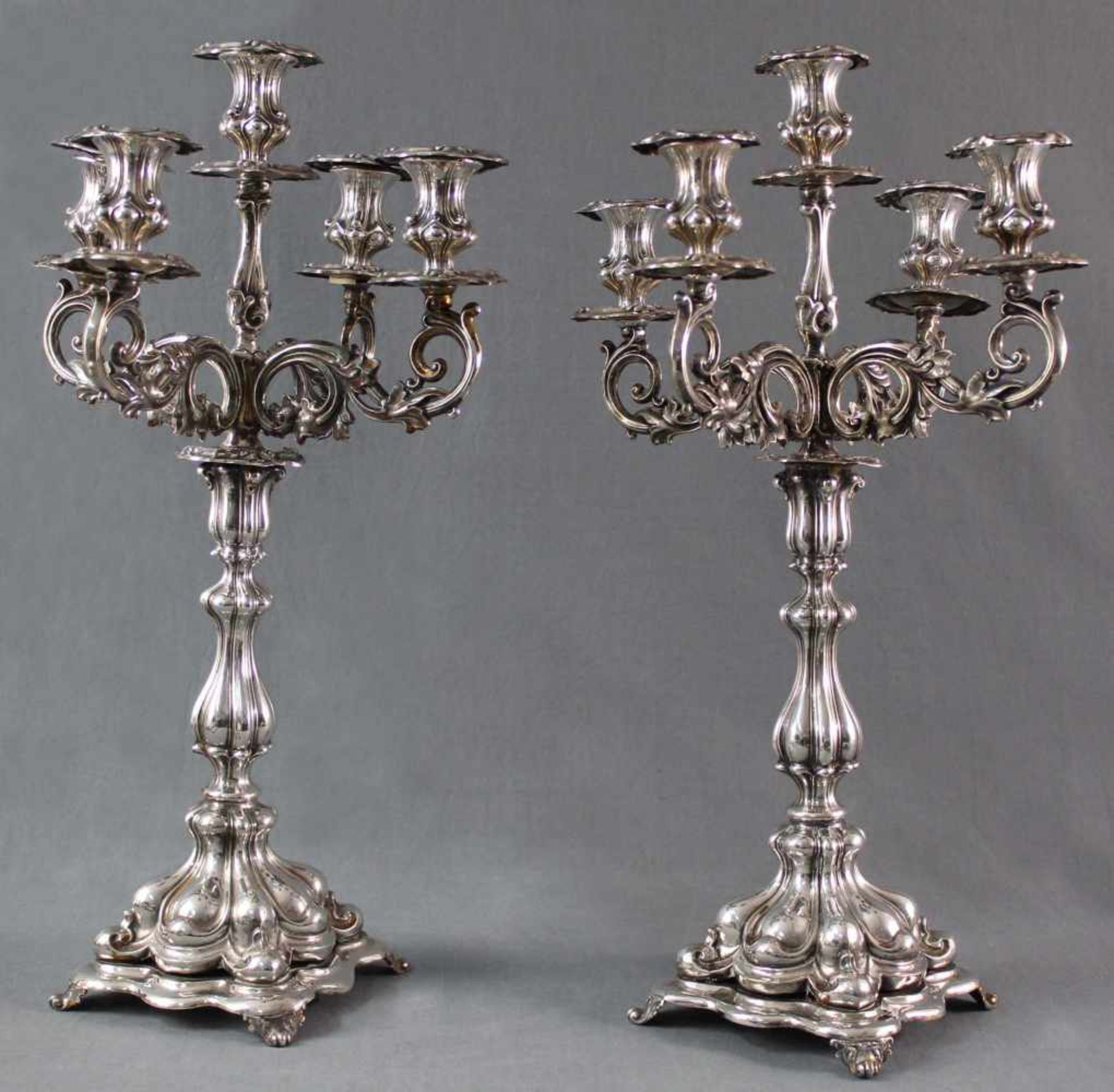 A pair of candlesticks, silver-plated, 5 flames. Punches.