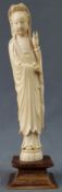 Lady with a blessing hand. China / Japan. Ivory. Old, around 1920.27 cm high with base. Carved.