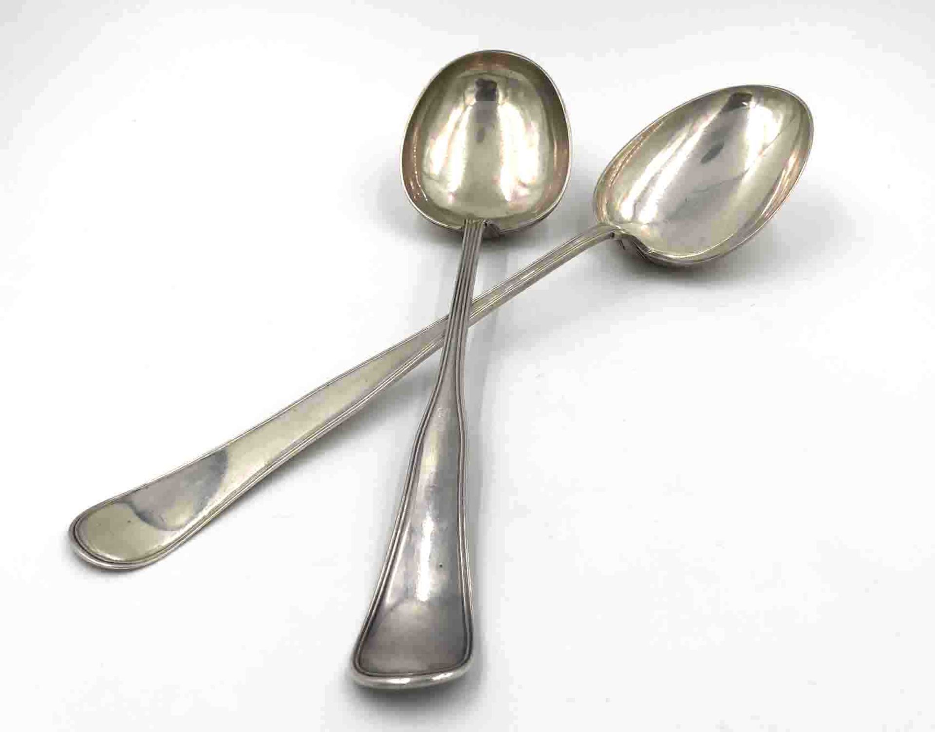 2 large silver spoons, Copenhagen. '' CLEMENT ''.450 grams. Up to 42 cm long. Each with three turret