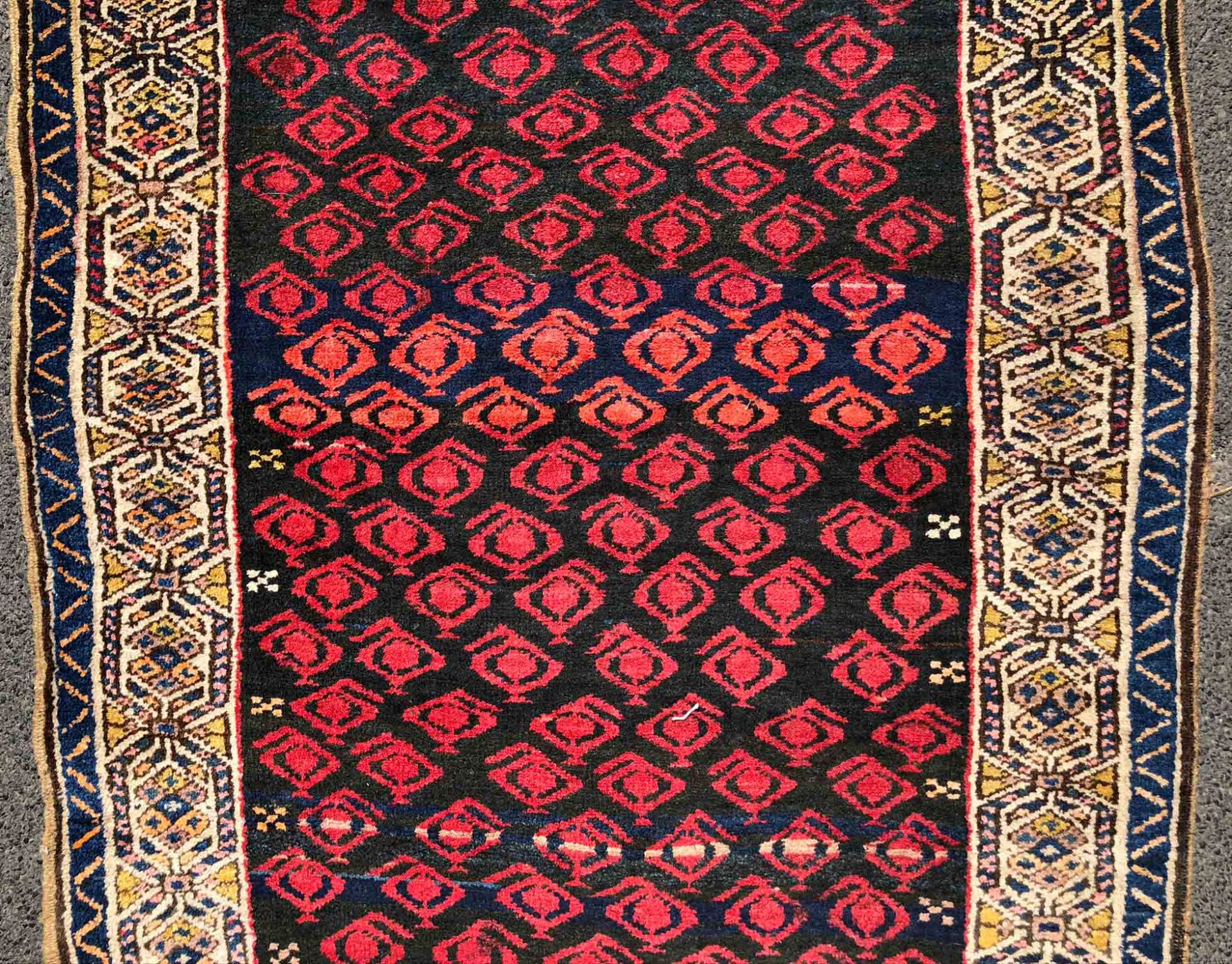 Hamadan Persian carpet. Iran. Antique, around 1910.352 cm x 108 cm. Knotted by hand. Wool on cotton. - Image 4 of 8