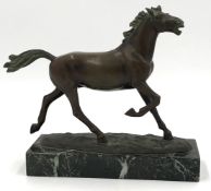 Erich SAALMANN (act.1918 - 1932). Stallion galloping. Sculpture.21 cm high with base. Signed.