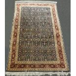 Hereke silk rug, Turkey. Extremely fine weave.197 cm x 127 cm. Knotted by hand. Silk on silk.