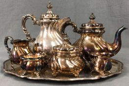 Silver 835.2971 grams gross. Tray (46 cm x 35 cm), coffee pot (25 cm high), teapot, milk jug, cream,