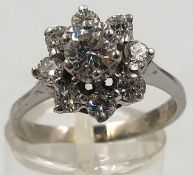 Diamond ring. White - gold 14 carat checked and stamped.The medium brilliant cut diamond is