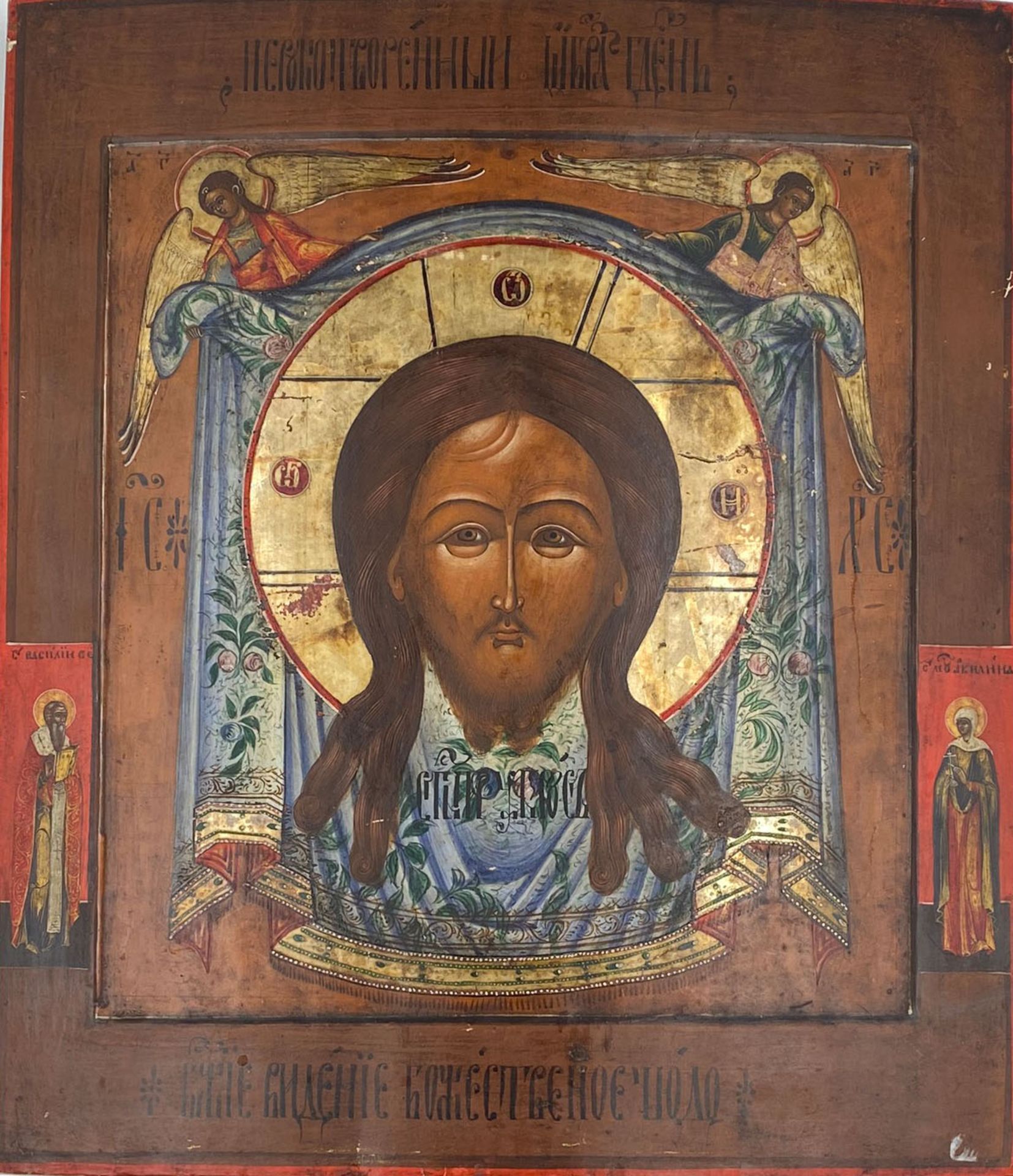 ICON (XIX). Jesus in front of a cloth held by two angels.45 cm x 39 cm. Painting. Mixed media.