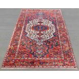 Bakhtiar Persian carpet. Iran. Old, mid 20th century.314 cm x 230 cm. Knotted by hand. Wool on