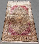 Qom Persian carpet. Silk rug. Iran. Very fine weave.205 cm x 137 cm. Knotted by hand. Silk on