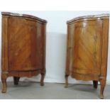 2 corner cabinets. Around 1800. Probably France. Ebonized. Marble tops.Each 81 cm high. Thigh length