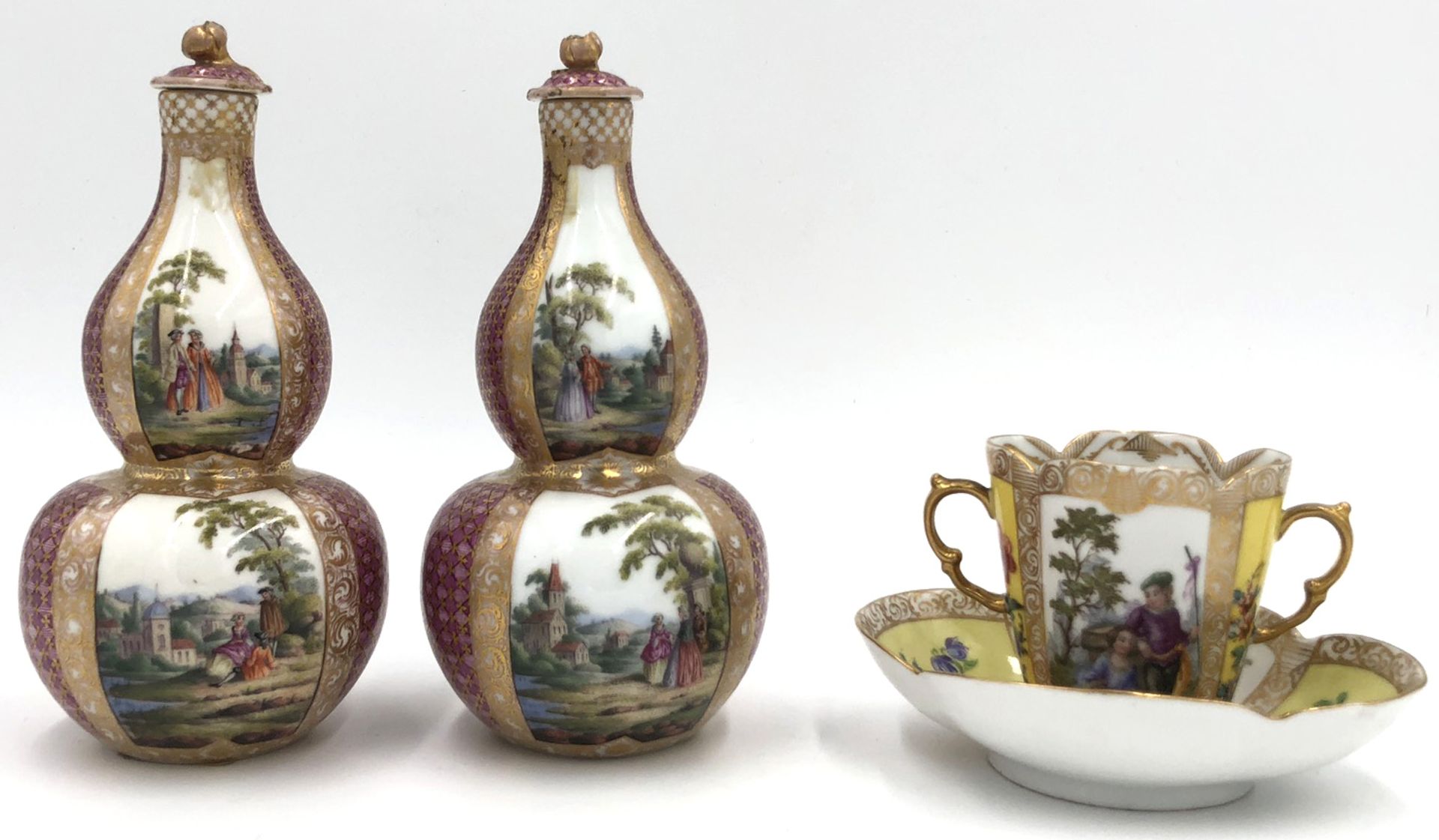 Porcelain. Probably early Meissen.2 double pumpkin bottles with stoppers, '' AR '' mark, and a cup