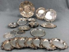 Silver. Plates, coasters and bowls.2176 grams. Up to 22 cm in diameter. Also 2 small coin bowls, (