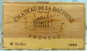 1995 Chateau de la Dauphine, Fronsac, France12 whole bottles. 12.5% Vol. 75 cl. OWC unopened. Mis